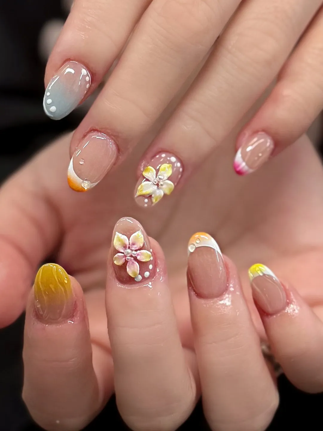 Pastel almond Gel-X with floral charms and hand-painted accents at L2 Nail Salon Mountain View