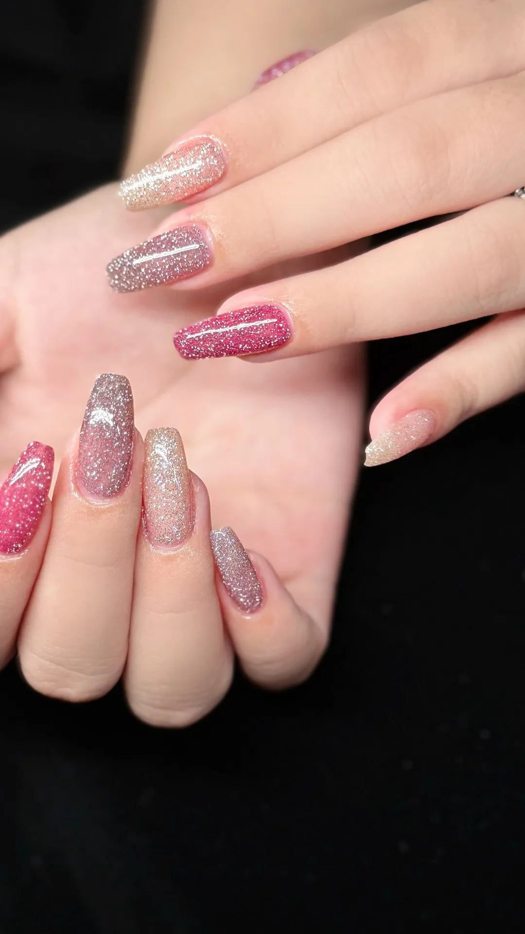Editorial close-up of glitter ombre coffin Gel-X — Heather at L2 Nail Salon Mountain View